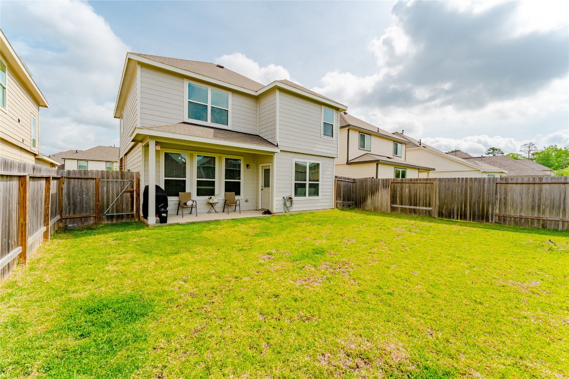 2835 Autumn Mist Lane Conroe, TX 77304 - Photo 27 of 33 Backyard