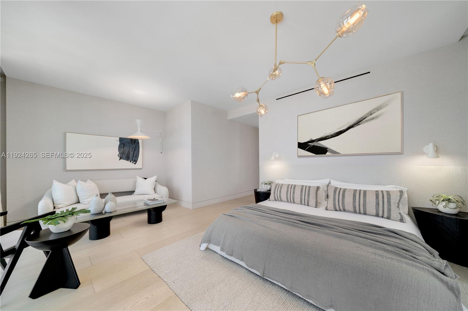 8955 Collins Avenue, Unit 702 Surfside, FL 33154 - Photo 21 of 56 a bedroom with furniture and a bed