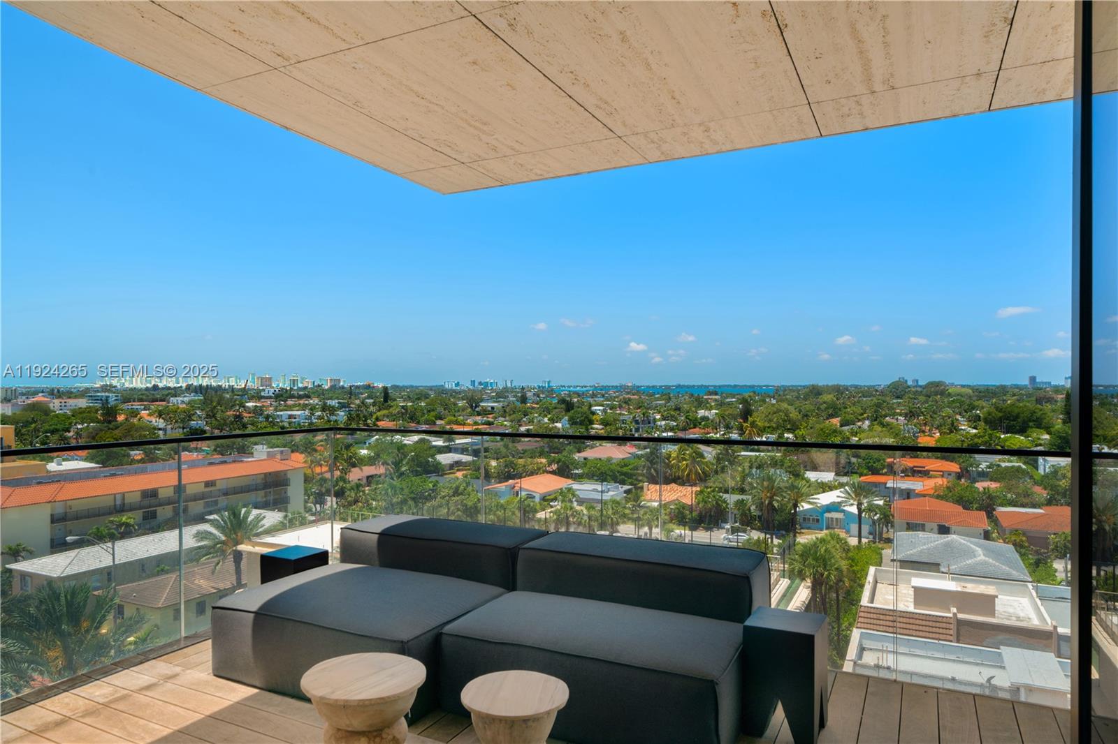 8955 Collins Avenue, Unit 702 Surfside, FL 33154 - Photo 46 of 56 a view of a chairs in a balcony