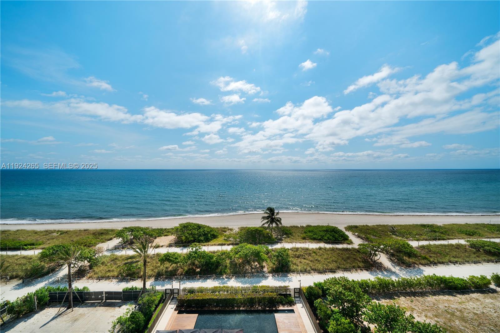 8955 Collins Avenue, Unit 702 Surfside, FL 33154 - Photo 47 of 56 a view of a city with an ocean