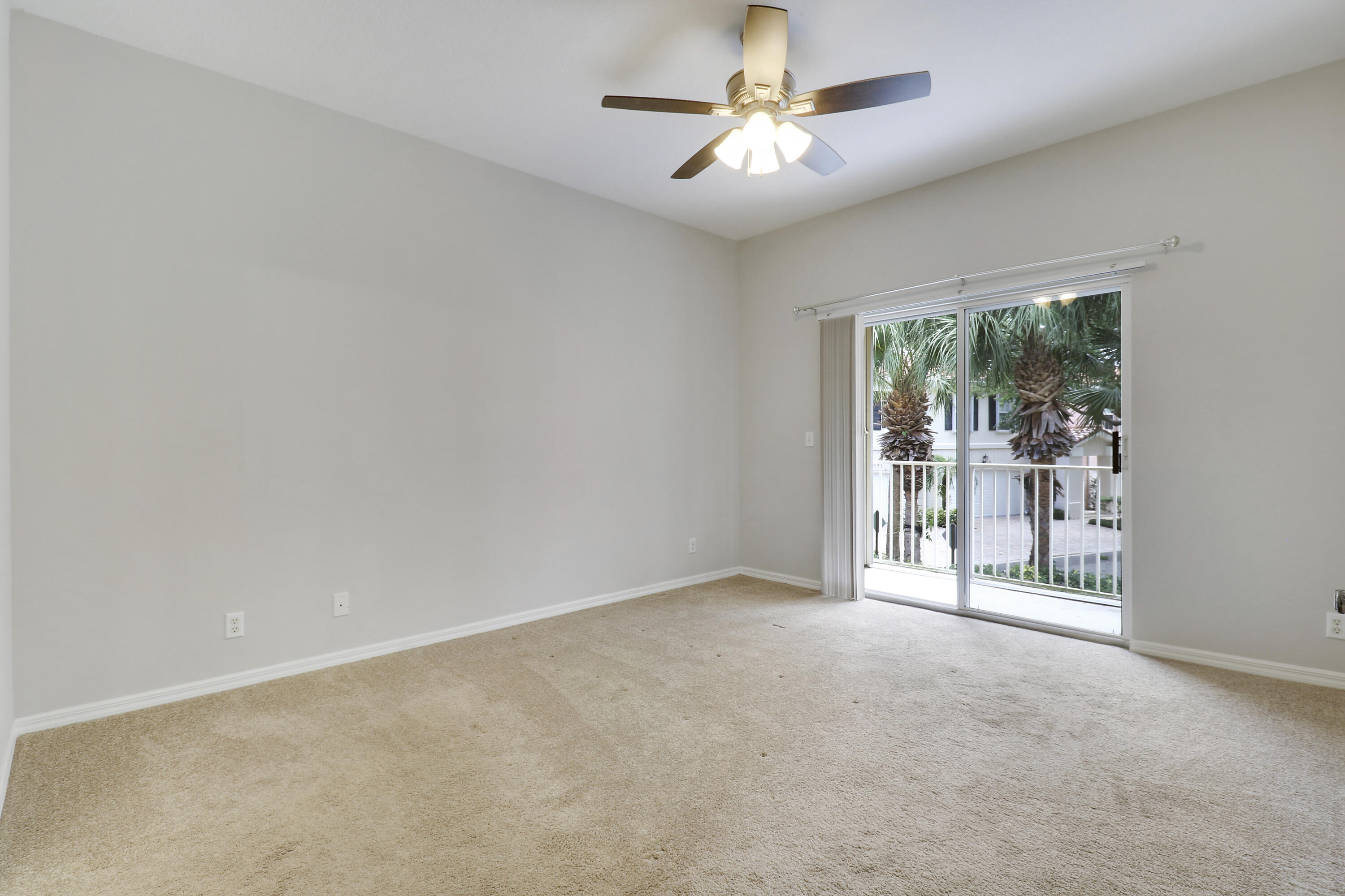 104 Lighthouse Circle, Unit H2 Tequesta, FL 33469 - Photo 19 of 45 an empty room with windows