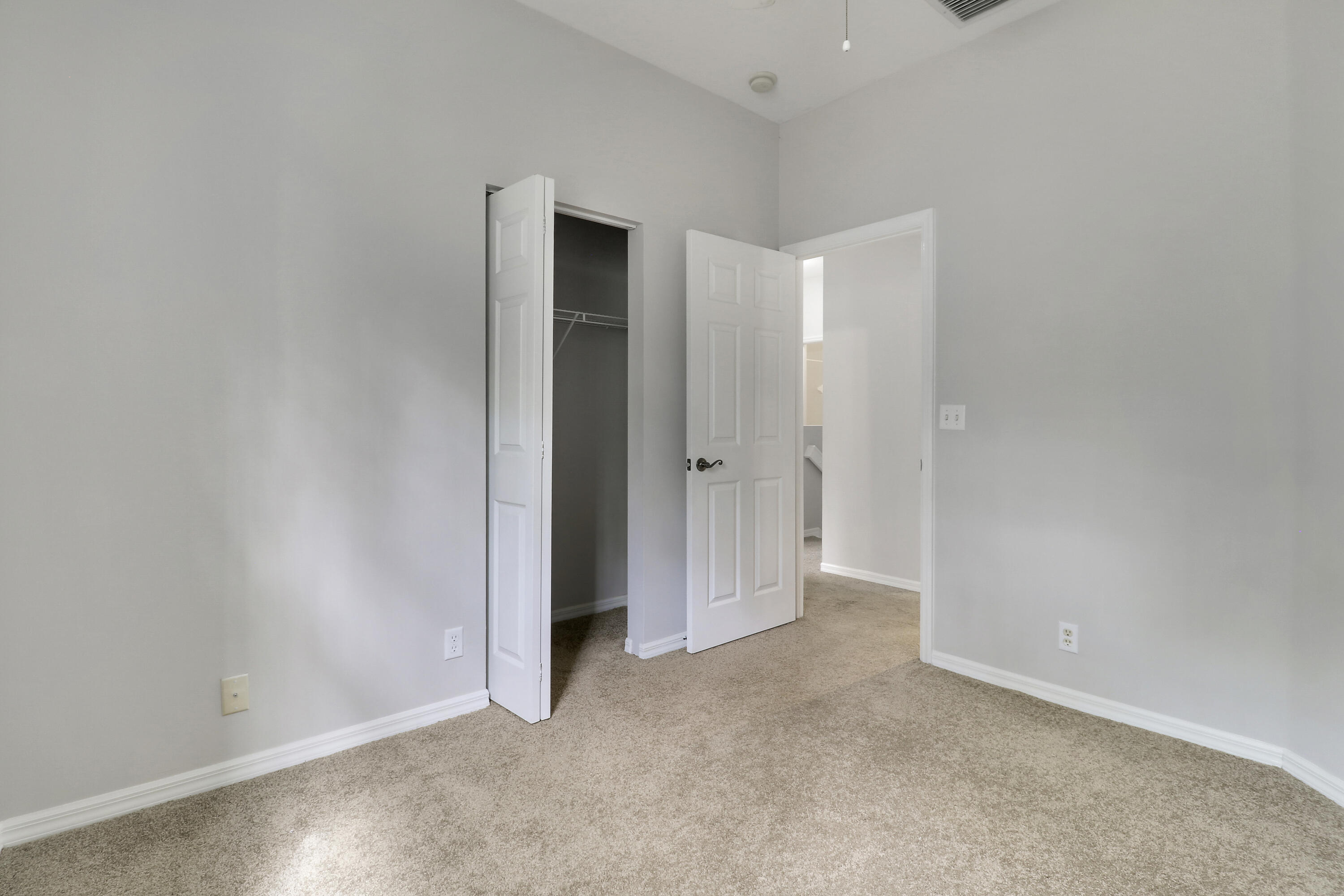 104 Lighthouse Circle, Unit H2 Tequesta, FL 33469 - Photo 27 of 45 an empty room with closet area