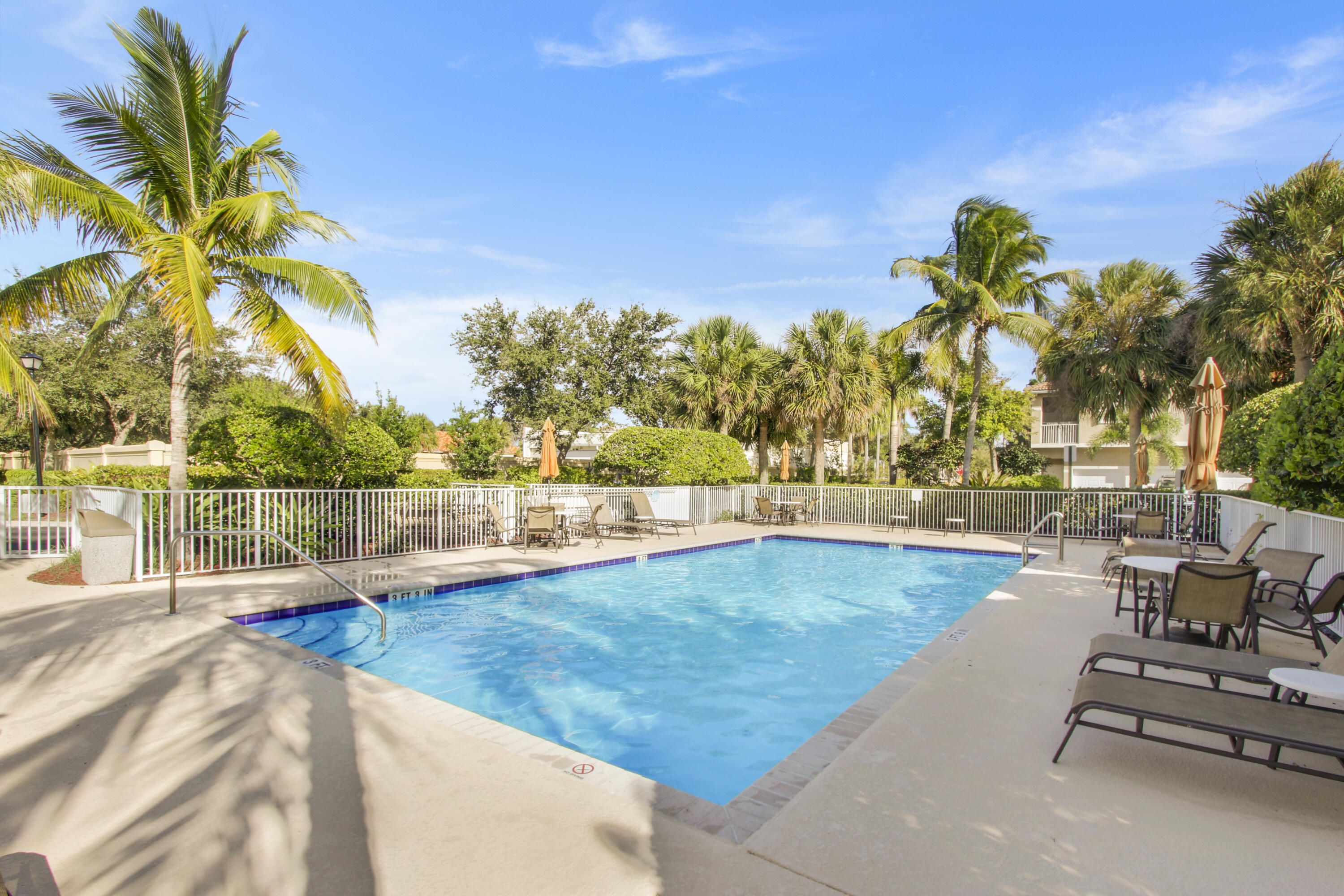 104 Lighthouse Circle, Unit H2 Tequesta, FL 33469 - Photo 36 of 45 a view of swimming pool with seating space