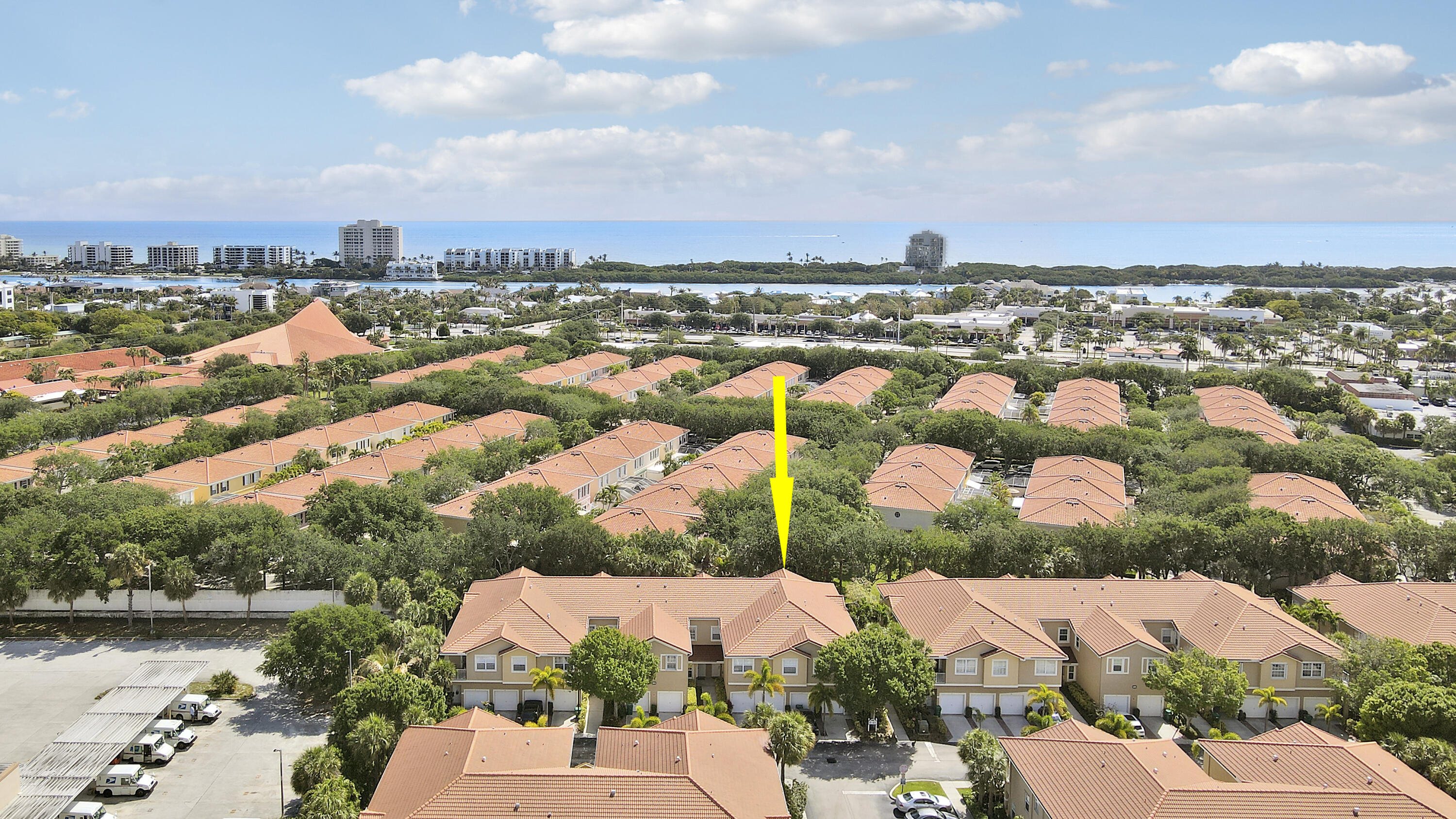 104 Lighthouse Circle, Unit H2 Tequesta, FL 33469 - Photo 38 of 45 an aerial view of residential houses with outdoor space
