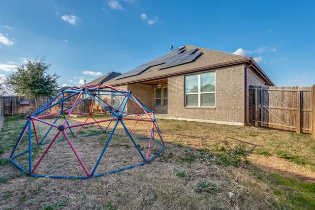 a view of outdoor space and front view of a house