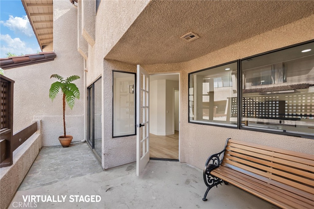 7 Wilderness Place Phillips Ranch, CA 91766 - Photo 25 of 25 a view of livingroom with furniture and windows