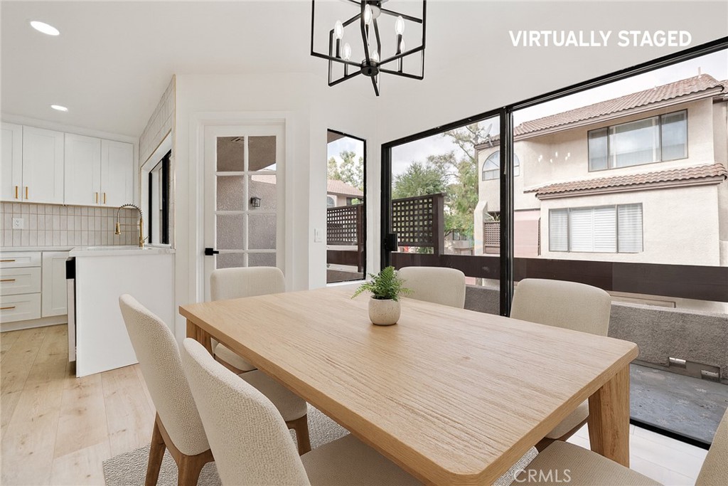 7 Wilderness Place Phillips Ranch, CA 91766 - Photo 8 of 25 a view of a dining room with furniture window and outside view