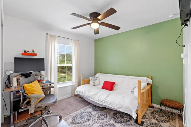 a kitchen with stainless steel appliances a stove sink microwave and cabinets
