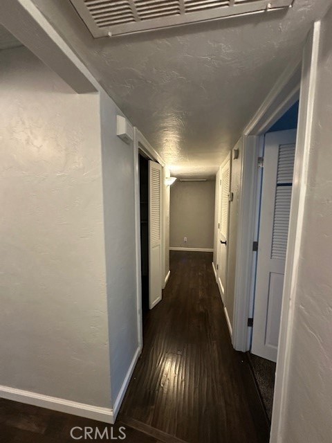 2550 4th Avenue Merced, CA 95340 - Photo 12 of 35 a view of hallway with wooden floor