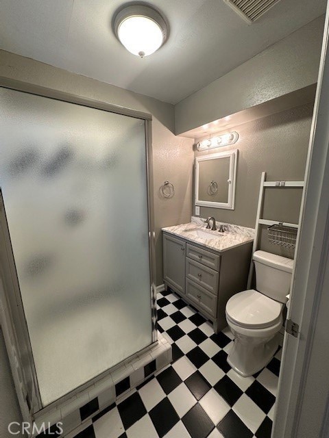 2550 4th Avenue Merced, CA 95340 - Photo 19 of 35 a bathroom with a sink toilet vanity and shower