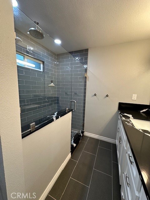 2550 4th Avenue Merced, CA 95340 - Photo 25 of 35 a bathroom with a shower and a sink
