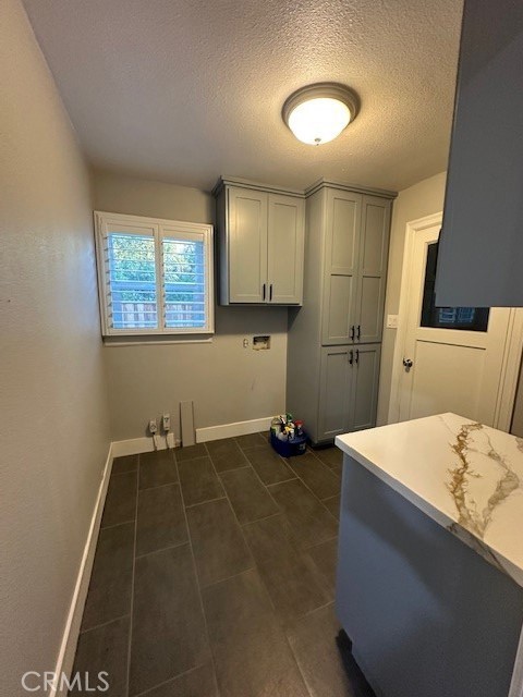 2550 4th Avenue Merced, CA 95340 - Photo 26 of 35 a room with a bed and a chandelier