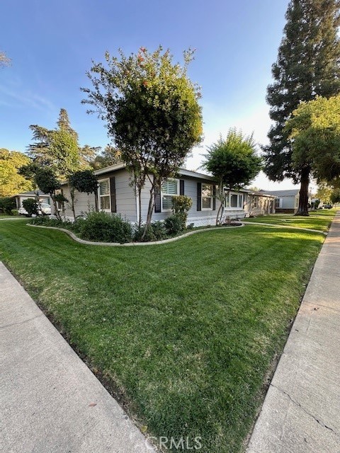 2550 4th Avenue Merced, CA 95340 - Photo 35 of 35 a front view of a house with a garden