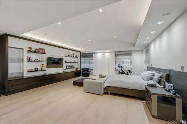 a bathroom with a bathtub a sink a toilet and a bathtub