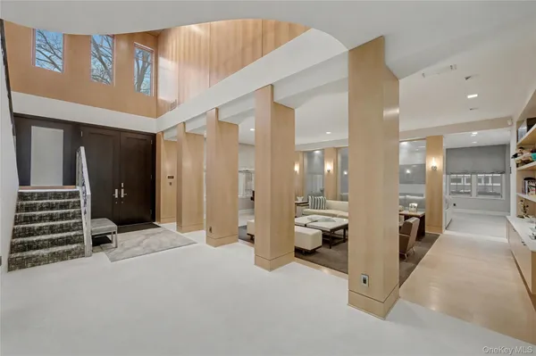 a living room with furniture and a table