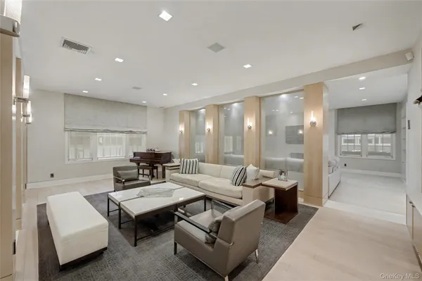 a living room with furniture and a table