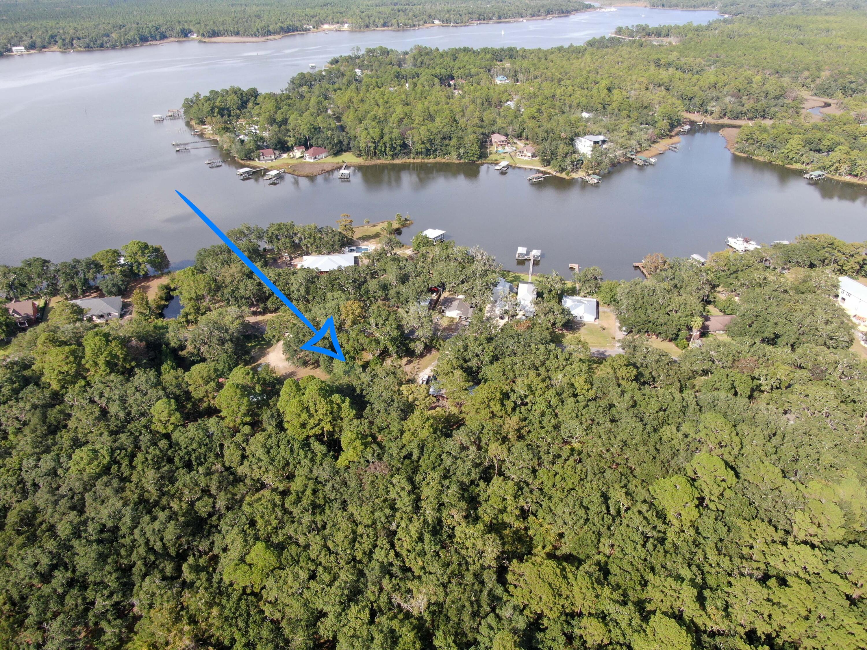 Xxx Bay Grove Road Freeport, FL 32439 - Photo 4 of 10 an aerial view of a houses with a lake view