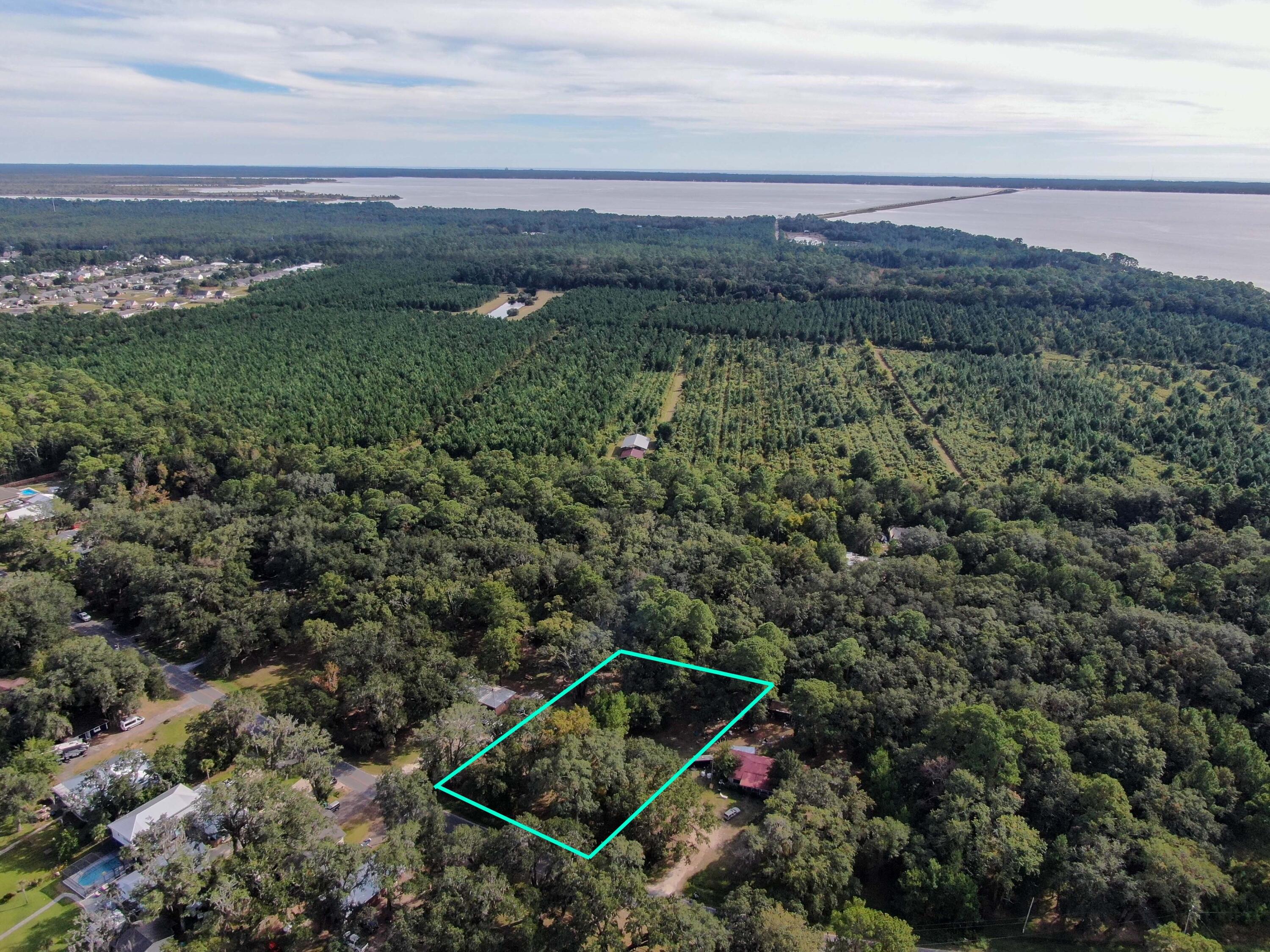 Xxx Bay Grove Road Freeport, FL 32439 - Photo 7 of 10 a view of a city with mountains in the background