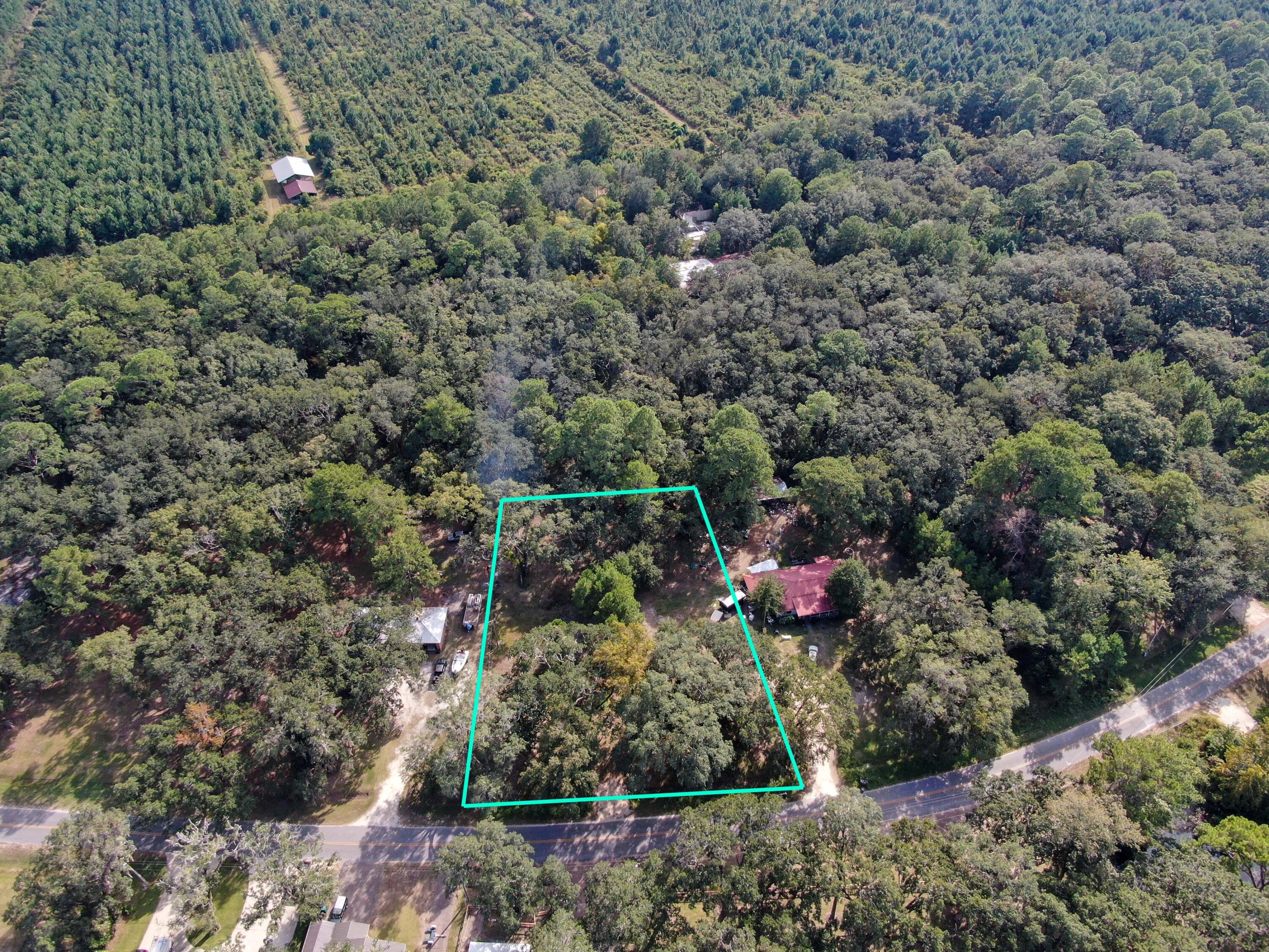 Xxx Bay Grove Road Freeport, FL 32439 - Photo 9 of 10 a view of a house with a street