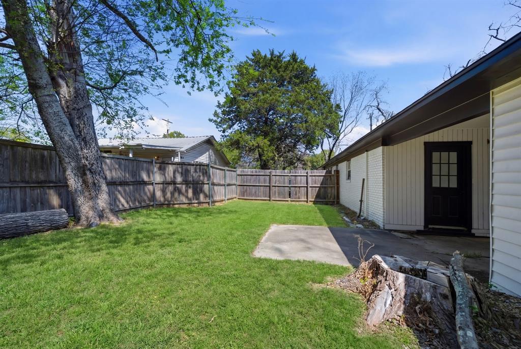 619 9th Street Terrell, TX 75160 - Photo 23 of 24 a view of a backyard with a garden