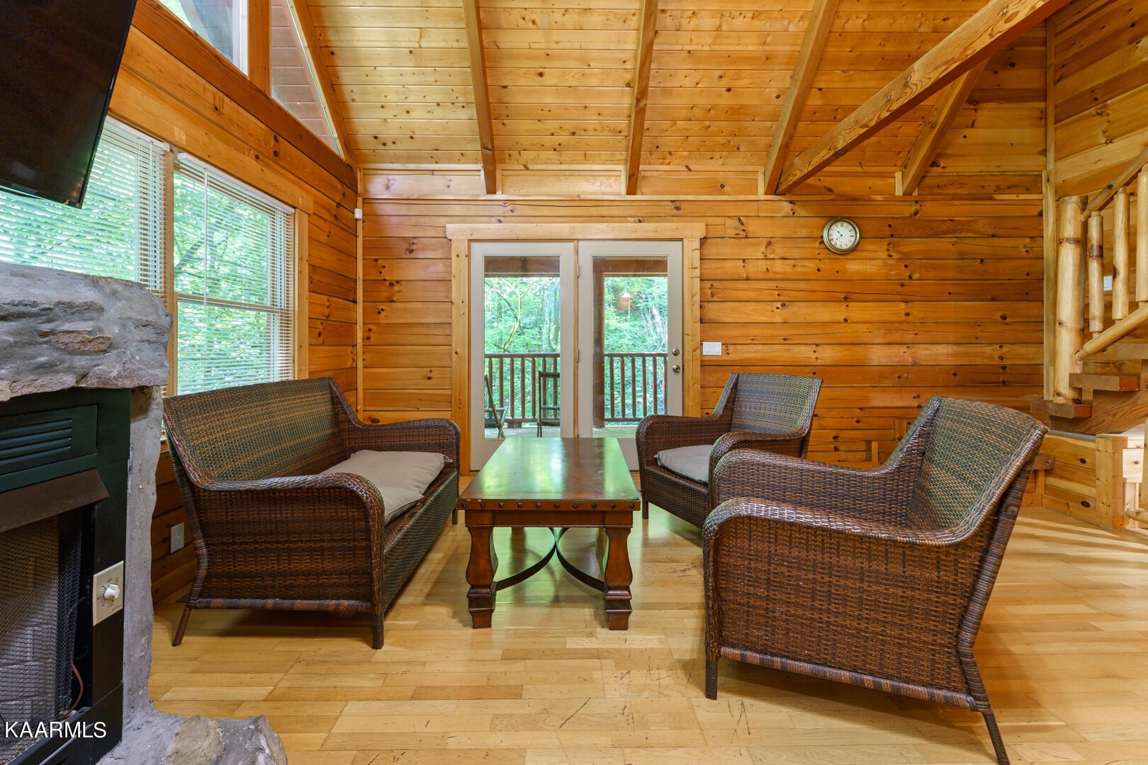 219 Edens Way Sevierville, TN 37876 - Photo 2 of 29 a view of a patio with couple of chairs and a couch