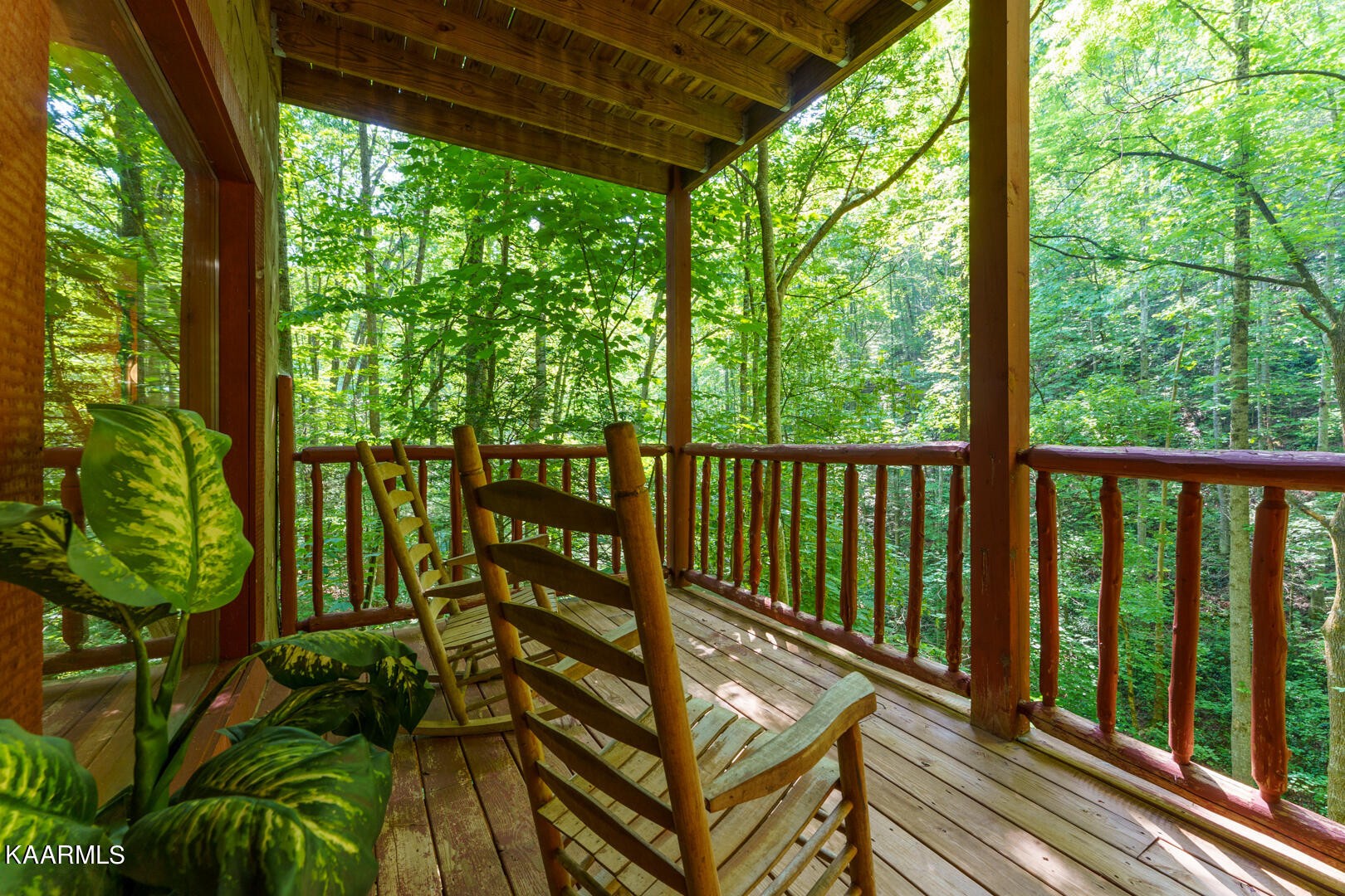 219 Edens Way Sevierville, TN 37876 - Photo 22 of 29 a view of a balcony with wooden floor