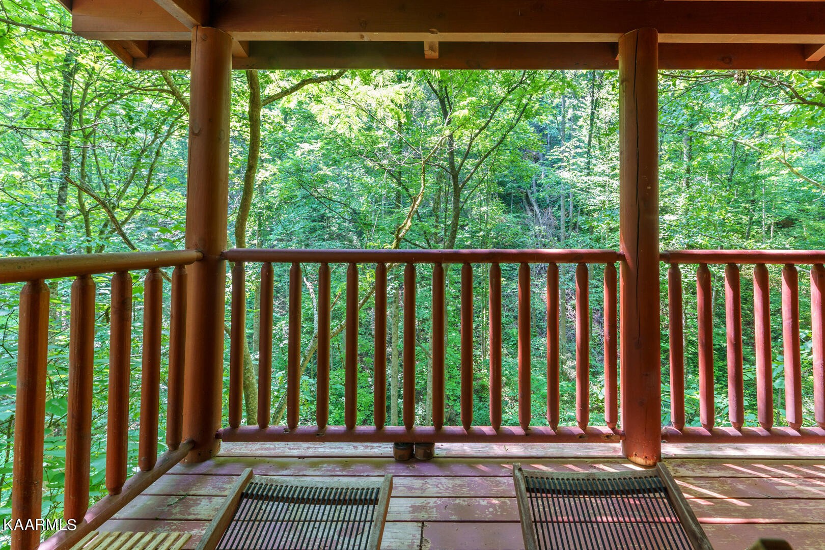 219 Edens Way Sevierville, TN 37876 - Photo 26 of 29 a view of a balcony with wooden floor