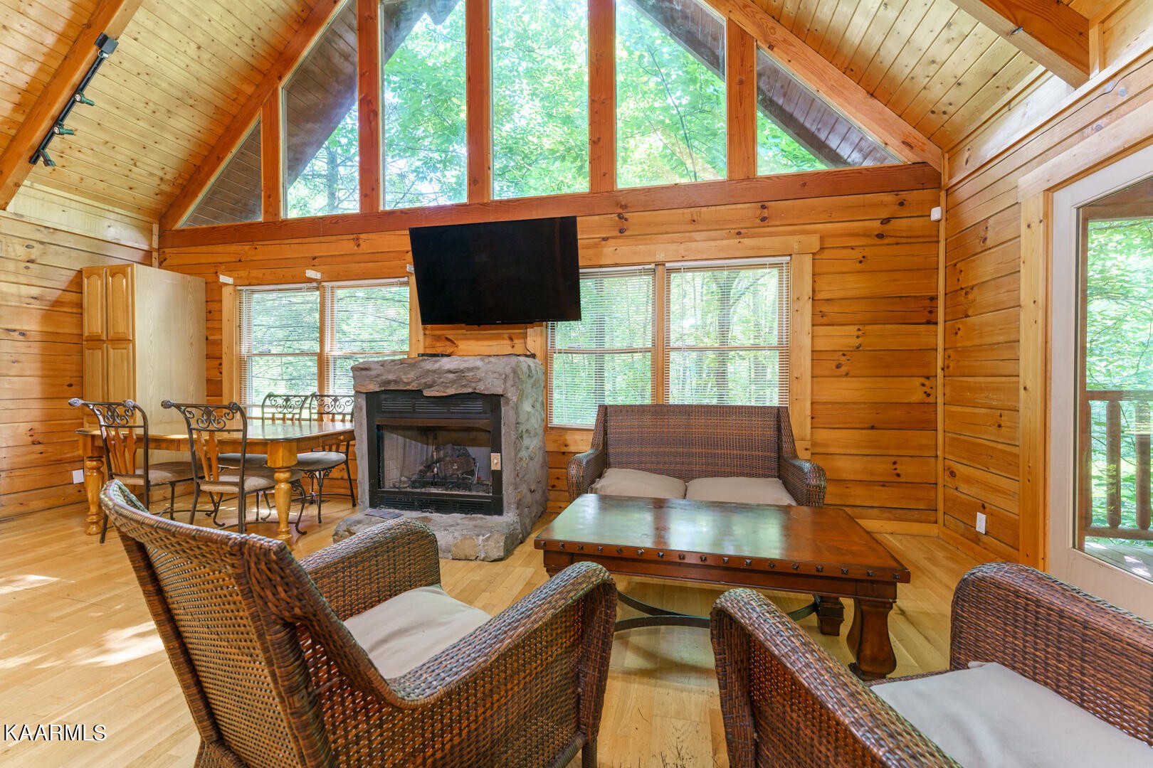 219 Edens Way Sevierville, TN 37876 - Photo 3 of 29 a living room with fireplace furniture and a flat screen tv