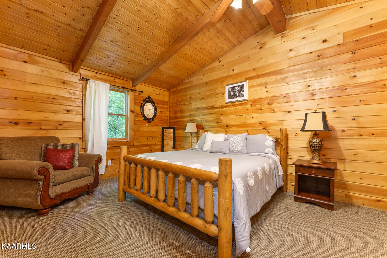 219 Edens Way Sevierville, TN 37876 - Photo 4 of 29 a bedroom with bed couch and window