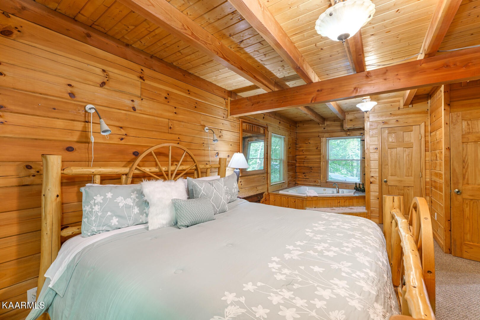 219 Edens Way Sevierville, TN 37876 - Photo 6 of 29 a bedroom with a bed and a painting on the wall