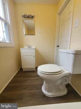 a bathroom with a toilet and a sink