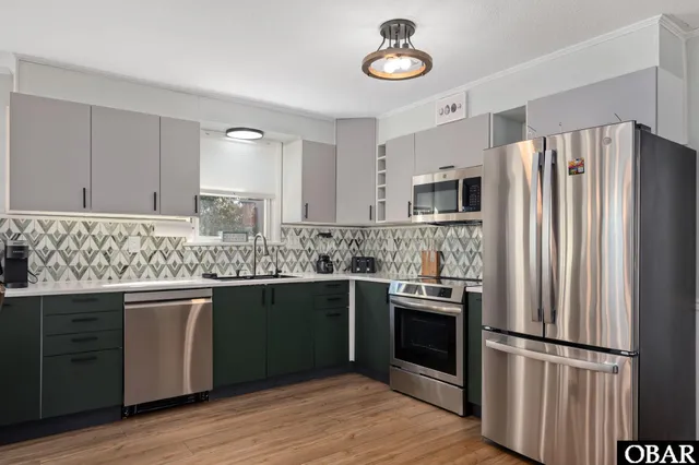 $695,000 | 429 Kitty Hawk Bay Drive, Kill Devil Hills, NC 27948