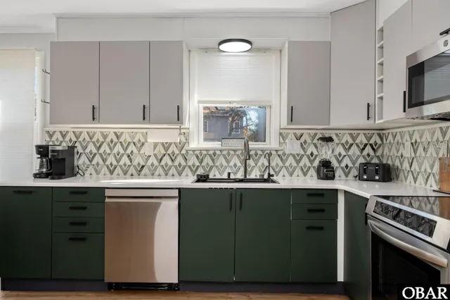 $695,000 | 429 Kitty Hawk Bay Drive, Kill Devil Hills, NC 27948