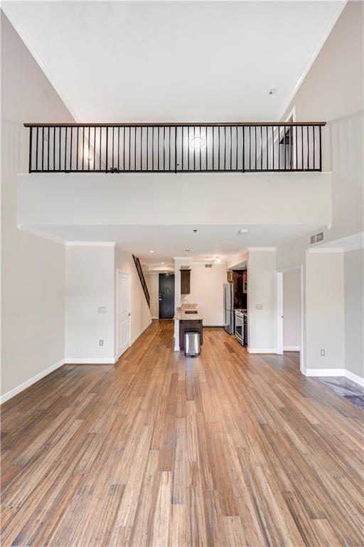 2626 Peachtree Road Northwest, Unit 412 Atlanta, GA 30305 - Photo 14 of 38 a view of empty room with wooden floor