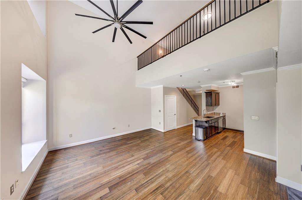 2626 Peachtree Road Northwest, Unit 412 Atlanta, GA 30305 - Photo 17 of 38 a view of outdoor space with wooden floor and white walls