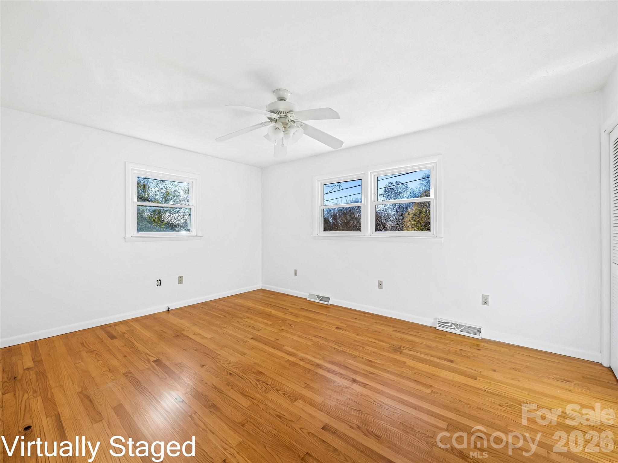 10 Ridge Avenue Asheville, NC 28803 - Photo 18 of 33 a view of empty room with wooden floor