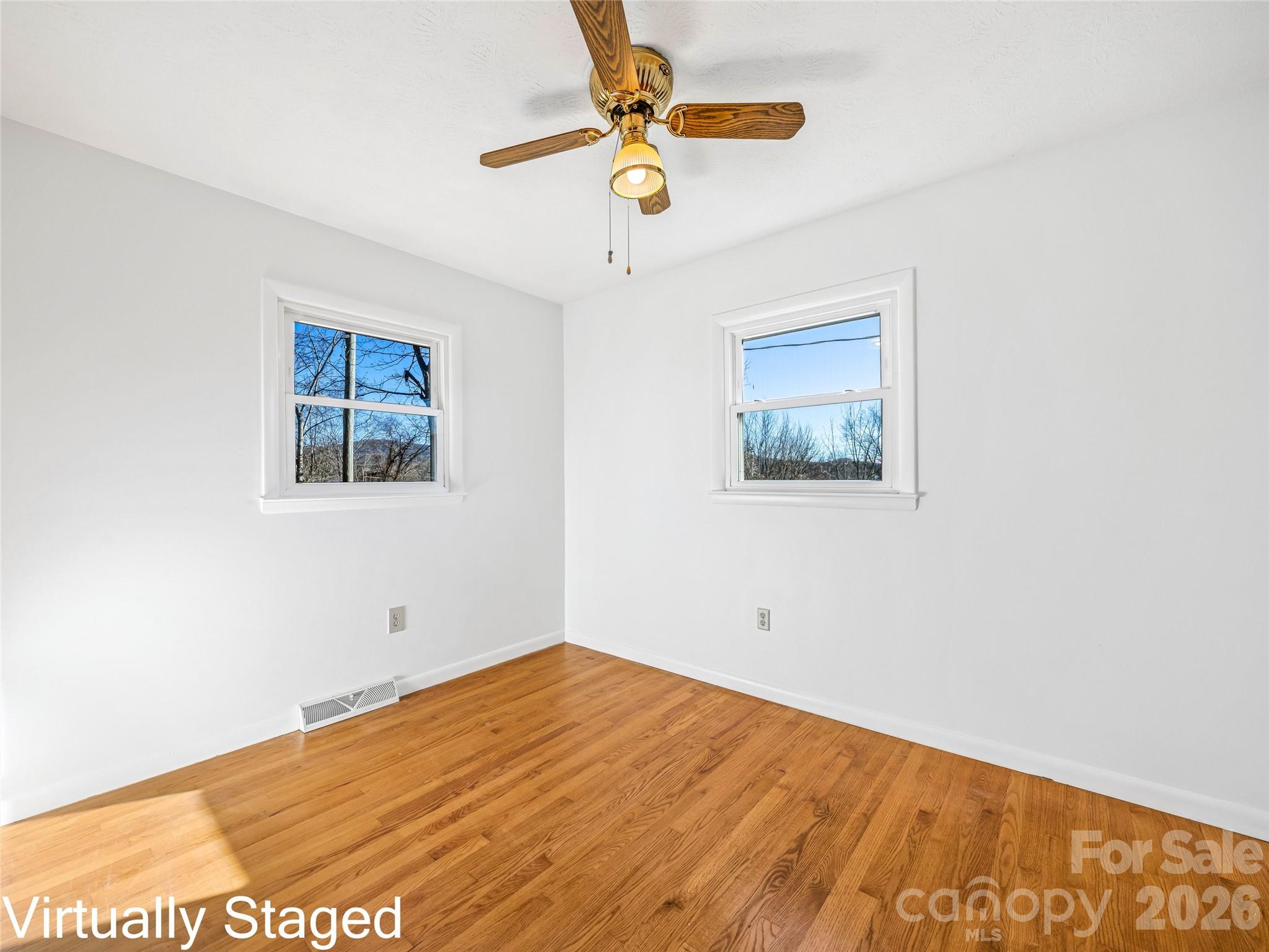 10 Ridge Avenue Asheville, NC 28803 - Photo 20 of 33 a view of empty room with wooden floor