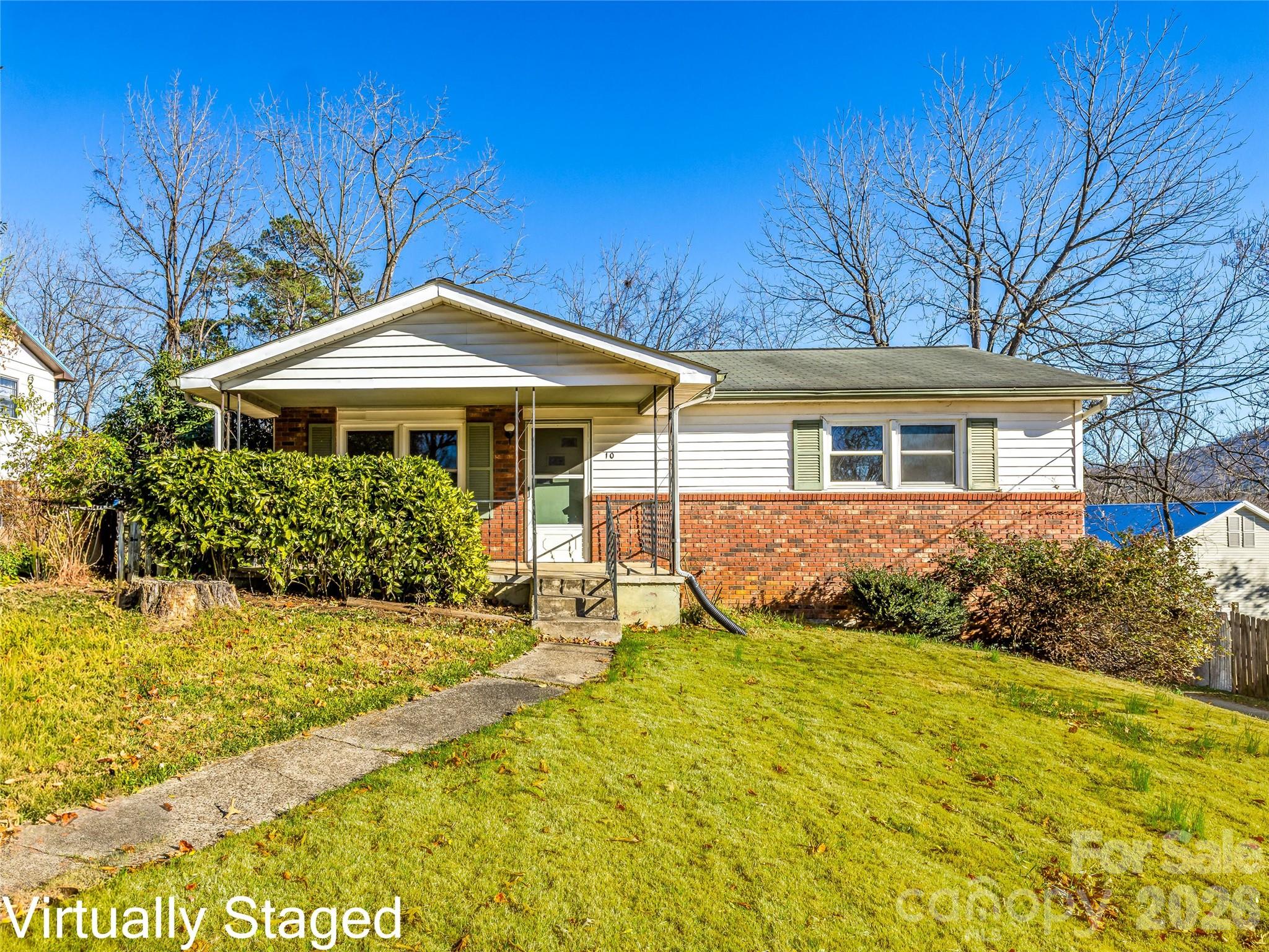 10 Ridge Avenue Asheville, NC 28803 - Photo 2 of 33 a front view of a house with yard and green space