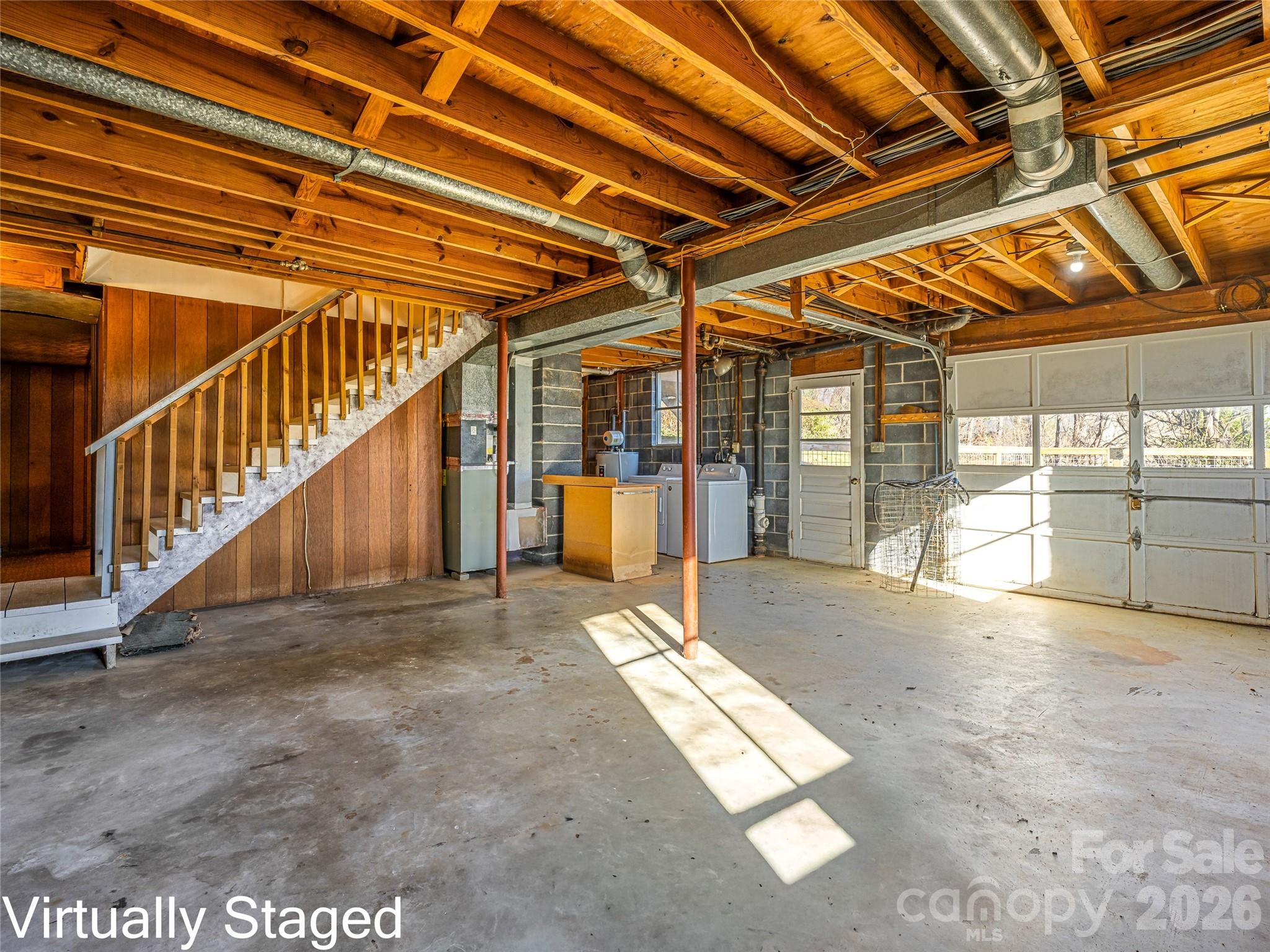 10 Ridge Avenue Asheville, NC 28803 - Photo 21 of 33 a view of an empty room with wooden floor