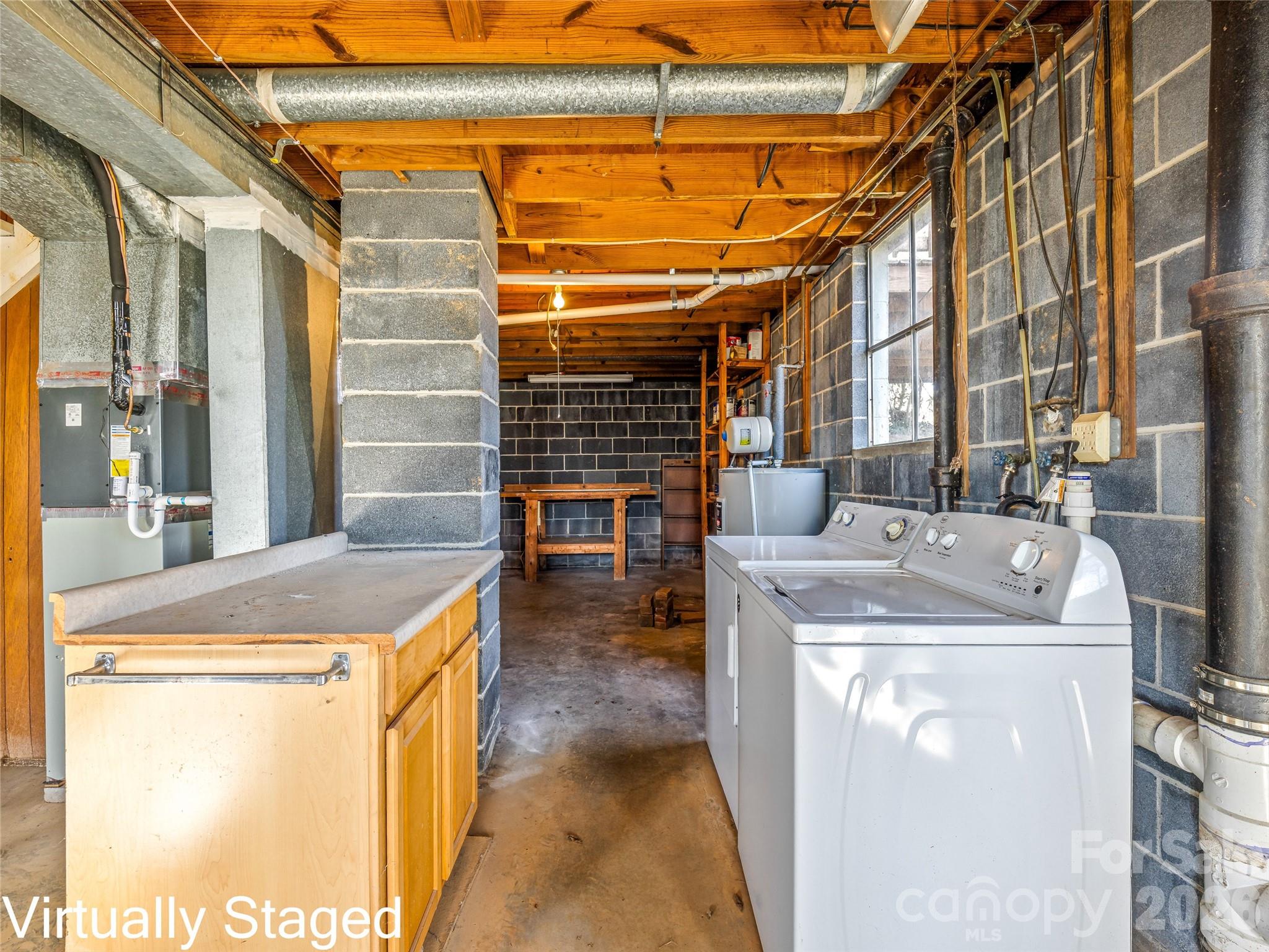 10 Ridge Avenue Asheville, NC 28803 - Photo 22 of 33 a view of a room with washer and dryer