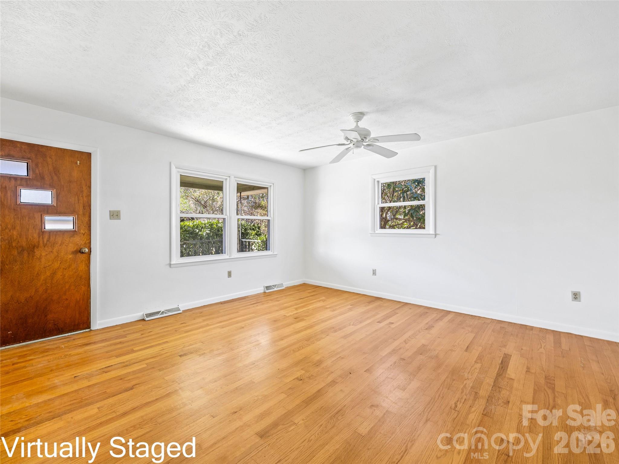 10 Ridge Avenue Asheville, NC 28803 - Photo 9 of 33 a view of an empty room with a window