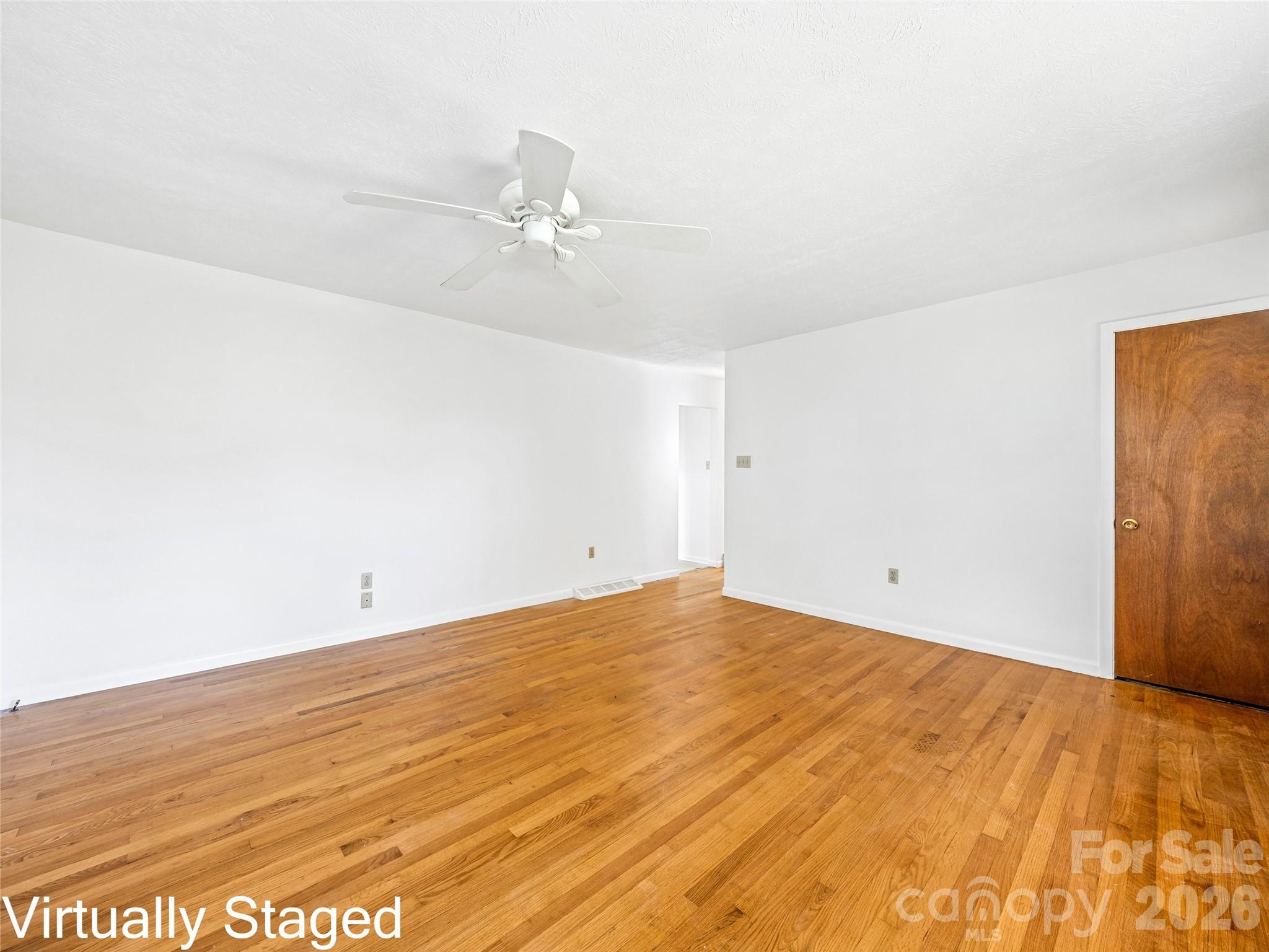 10 Ridge Avenue Asheville, NC 28803 - Photo 10 of 33 a view of empty room with wooden floor