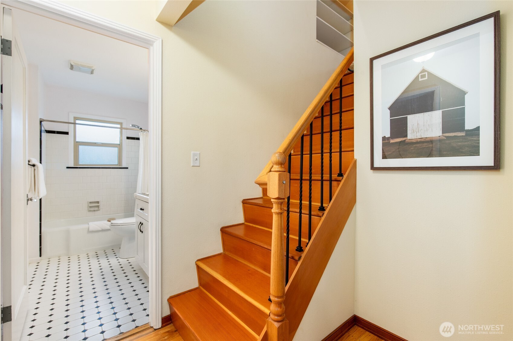 8625 35th Avenue Southwest Seattle, WA 98126 - Photo 17 of 33 a bathroom with a sink and a mirror