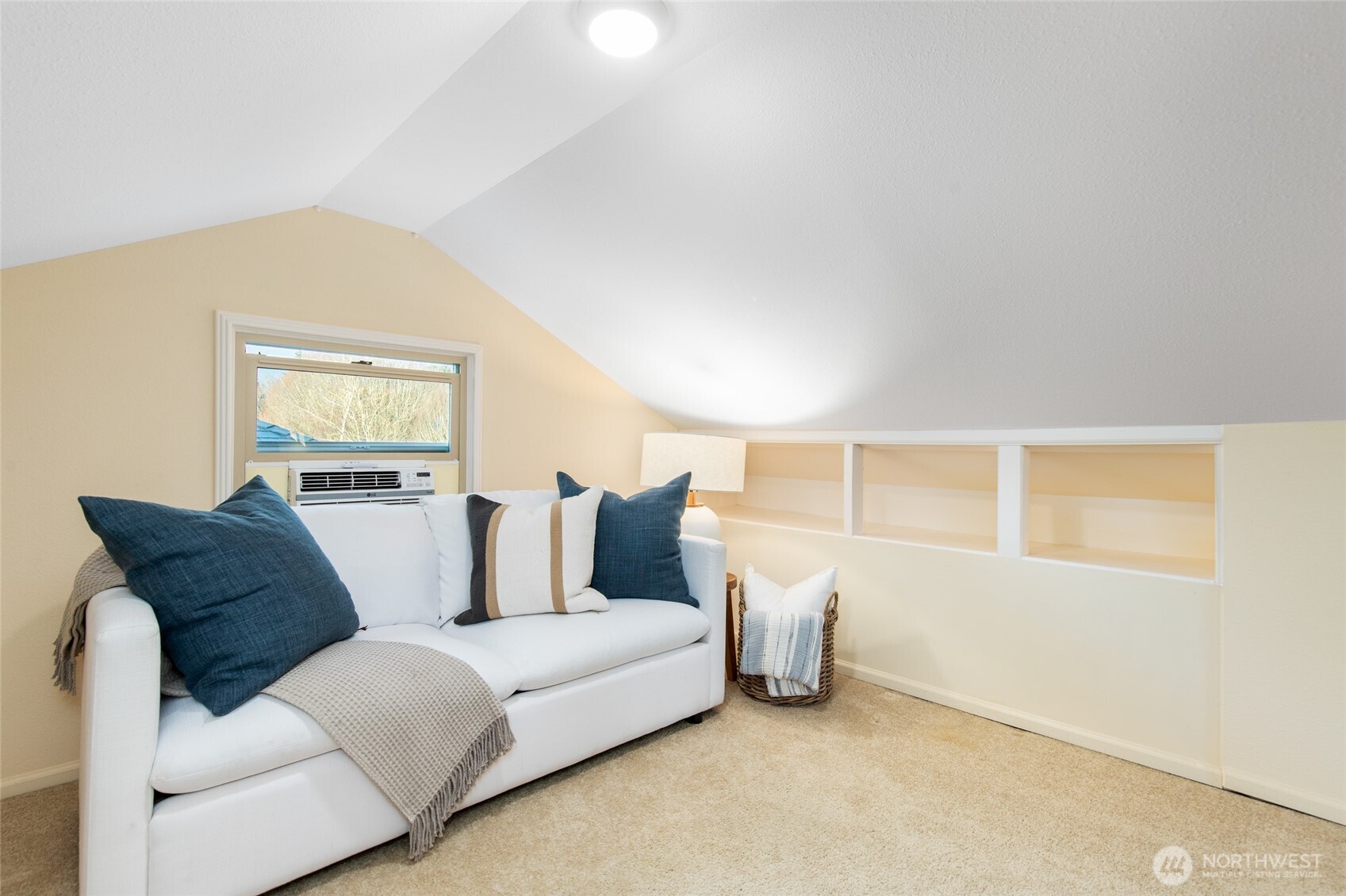 8625 35th Avenue Southwest Seattle, WA 98126 - Photo 18 of 33 a living room with furniture and a window