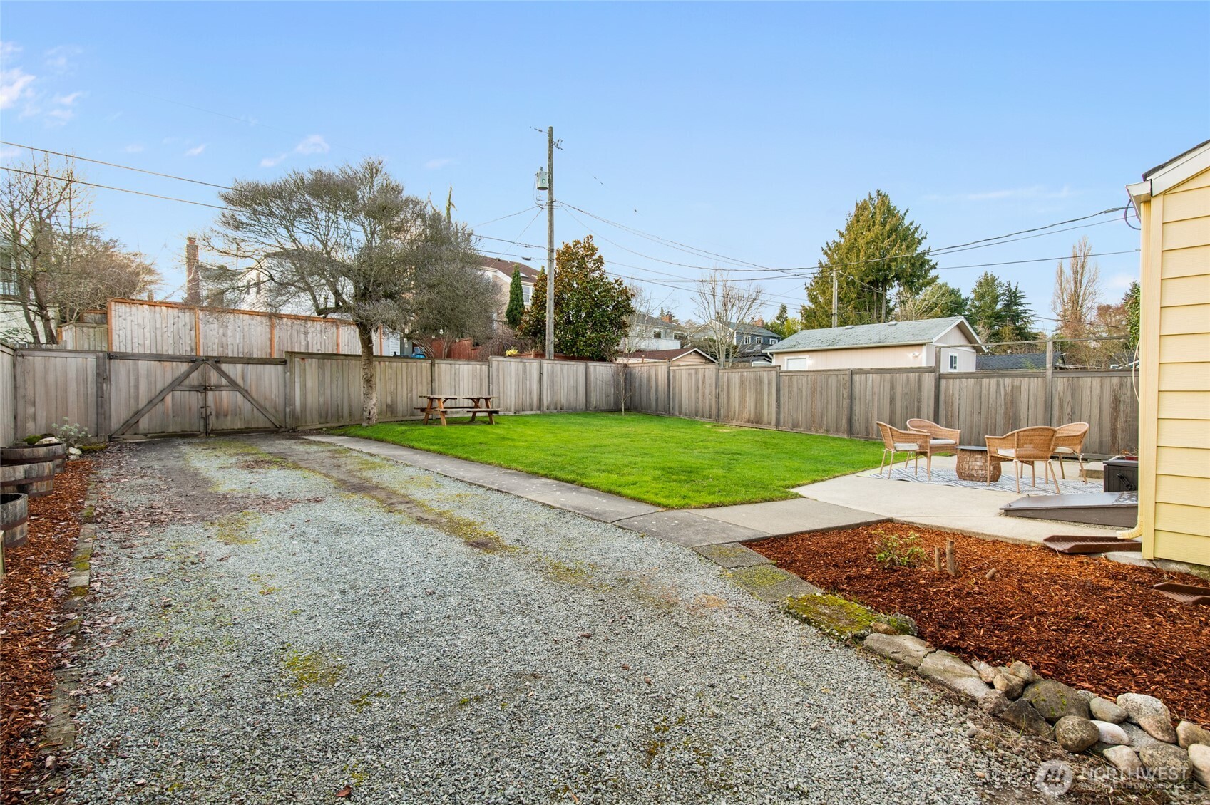 8625 35th Avenue Southwest Seattle, WA 98126 - Photo 26 of 33 a view of a backyard with a garden