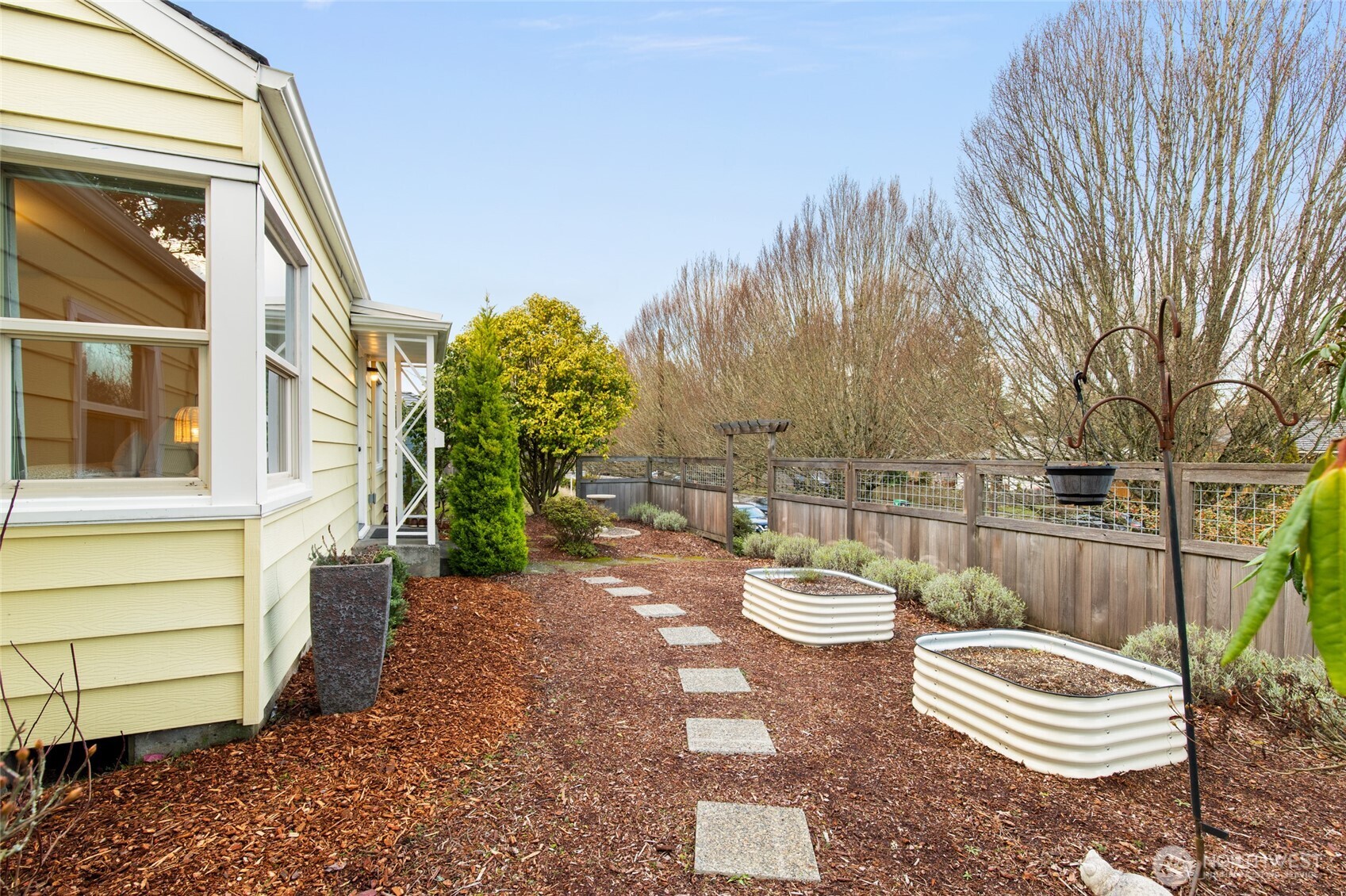 8625 35th Avenue Southwest Seattle, WA 98126 - Photo 28 of 33 a view of a two chairs in the patio