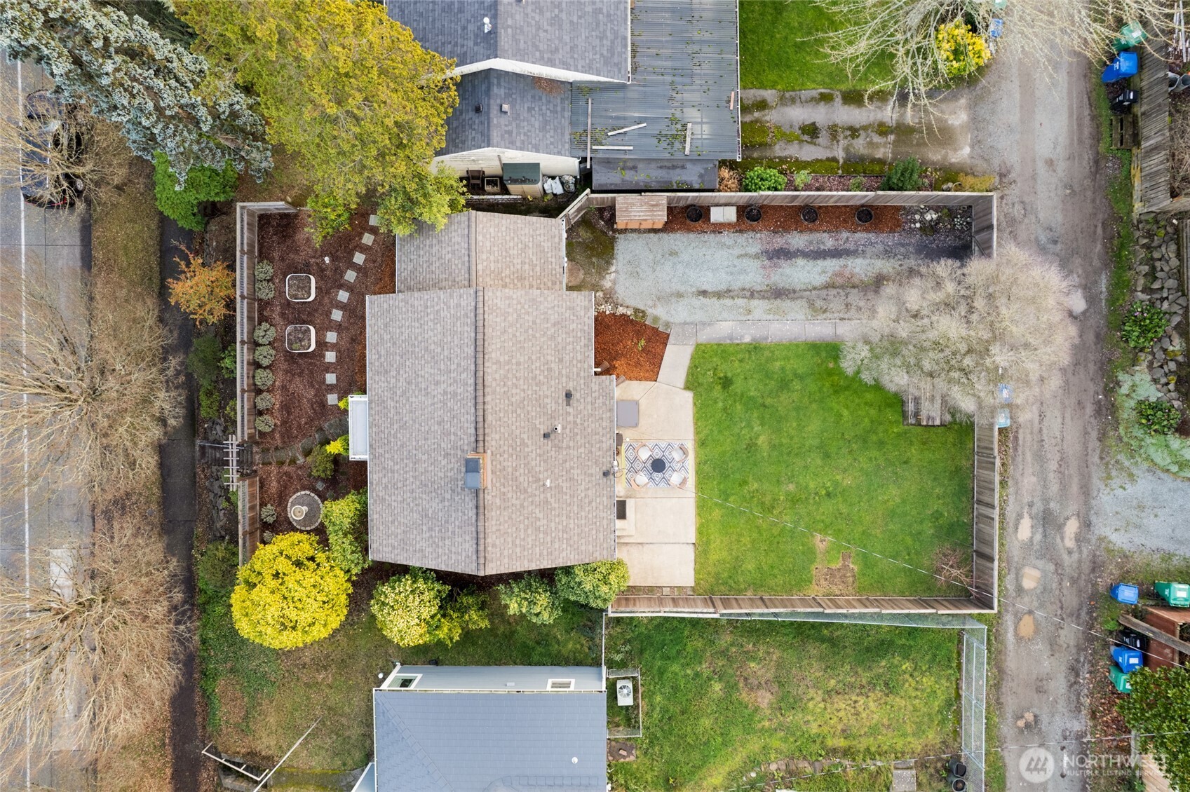 8625 35th Avenue Southwest Seattle, WA 98126 - Photo 30 of 33 an aerial view of a house with outdoor space