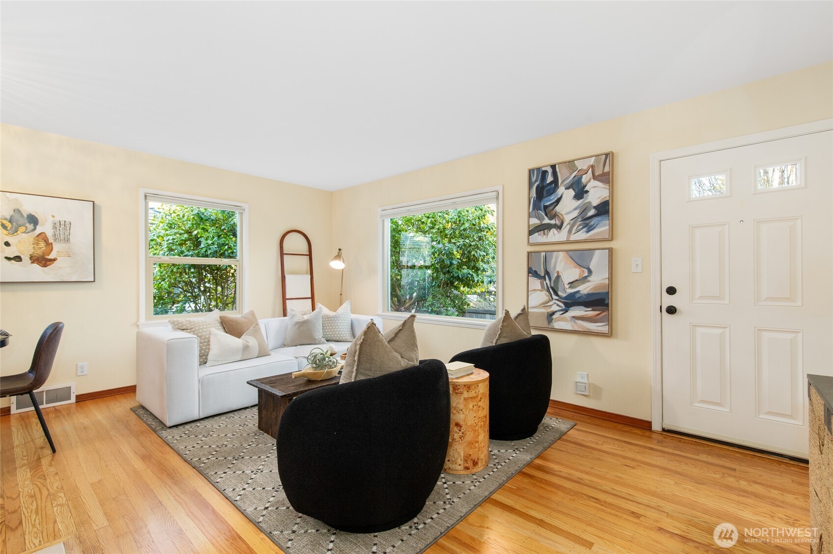 8625 35th Avenue Southwest Seattle, WA 98126 - Photo 3 of 33 a living room with furniture and a window