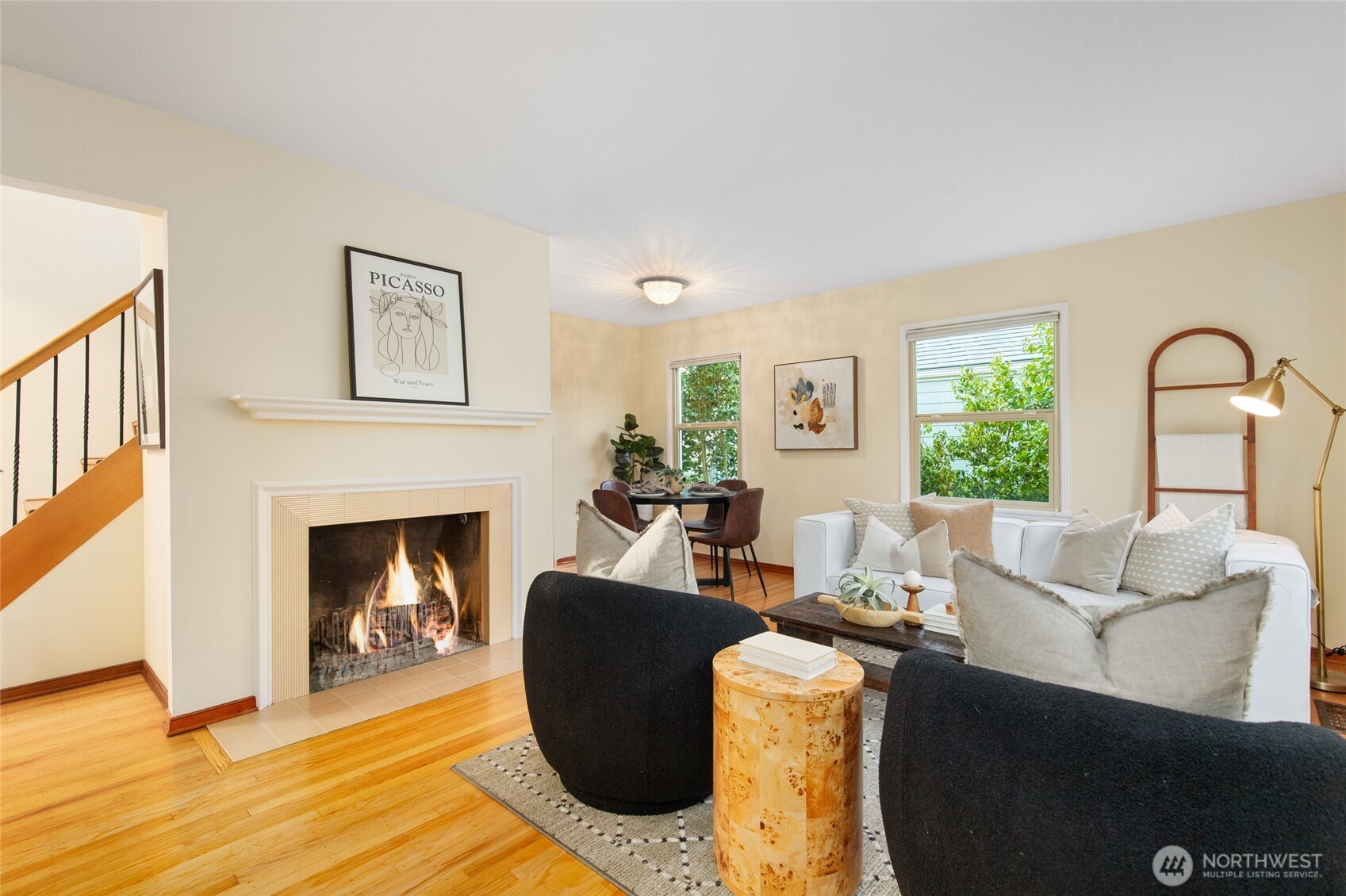 8625 35th Avenue Southwest Seattle, WA 98126 - Photo 4 of 33 a living room with furniture and a fireplace