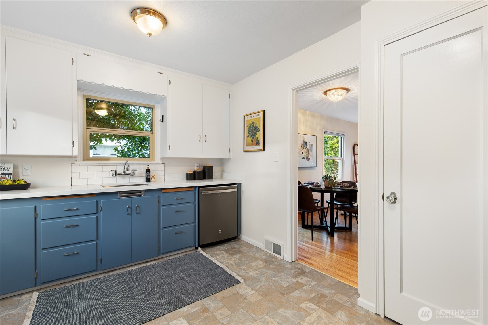 8625 35th Avenue Southwest Seattle, WA 98126 - Photo 9 of 33 a kitchen with stainless steel appliances granite countertop a refrigerator and a sink